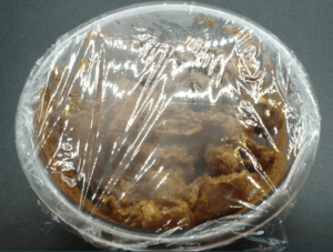 Bowl covered with plastic wrap