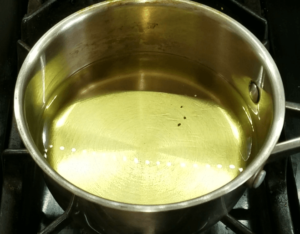Heating oil for frying homemade Egyptian falafel