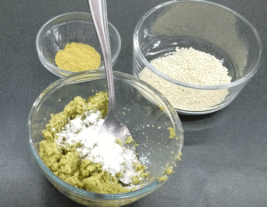 Add baking powder to the Egyptian falafel mixture