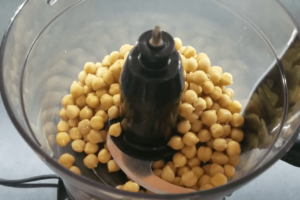 Ingredients for an easy Mediterranean hummus recipe, including chickpeas