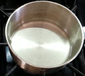 Heating oil to fry onions for Koshari
