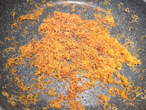 golden brown vermicelli in a pan