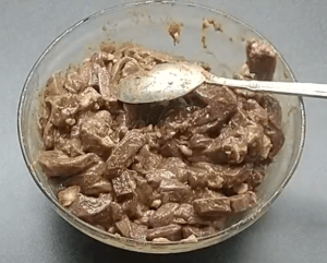 strips of Raw beef liver in a bowl