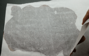 Date paste rolled to a rectangular shape between 2 parchment sheets.