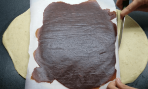 date paste spread on top of the dough