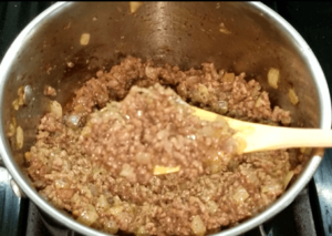 Cooked ground beef in a pan