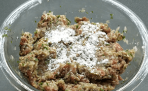 baking powder sprinkled on top of seasoned ground beef