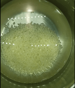 rice and water in a pot