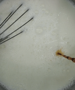 Adding Vanilla extract to the milk