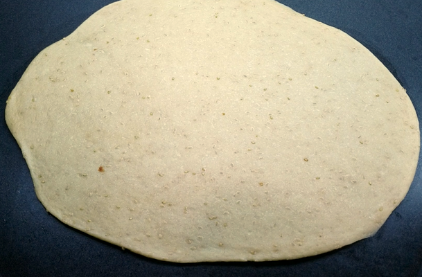 Rolling the dough for the vegan date pinwheel cookies.