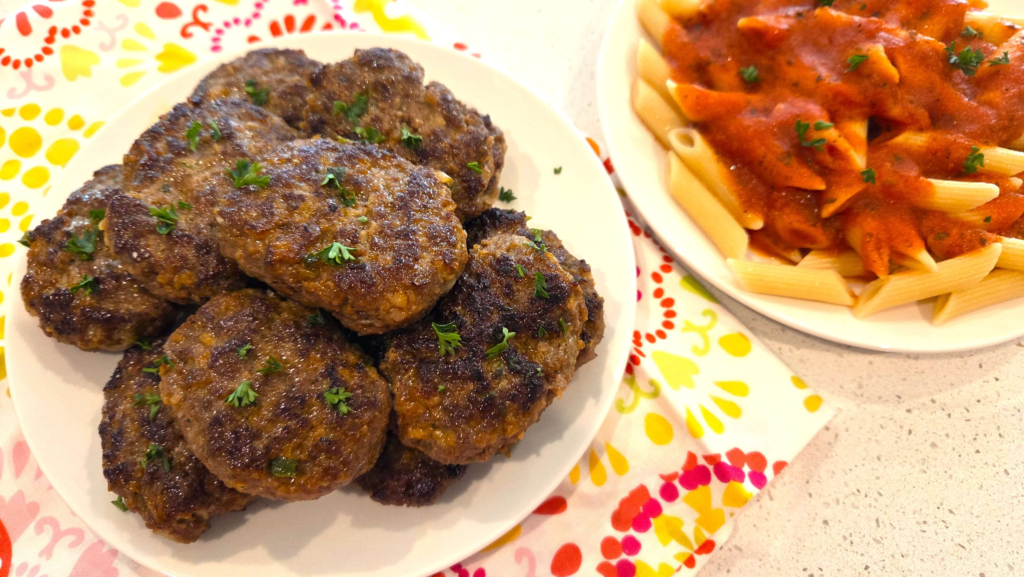 Authentic Turkish beef kofte served with parsley and pasta