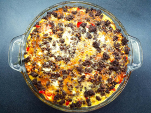 Egyptian eggah baking in oven until golden and set on top