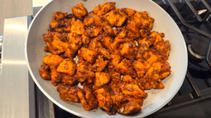 Caramelized spicy honey garlic chicken bites coated in sticky garlic honey sauce