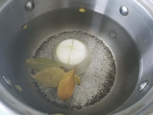 Preparing to boil chicken to make Egyptian chicken noodle soup