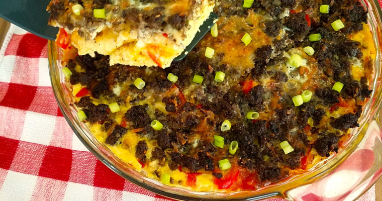 Easy Egyptian eggah recipe baked in a pan, fluffy herb egg dish with onions, sliced and ready to serve