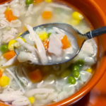 Easy Egyptian chicken noodle soup with vegetables and small pasta shells in a cozy homemade broth