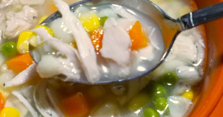 Easy Egyptian chicken noodle soup with vegetables and small pasta shells in a cozy homemade broth