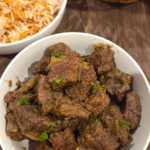 Authentic Egyptian kabab halla made with tender braised beef and caramelized onions in a rich savory sauce