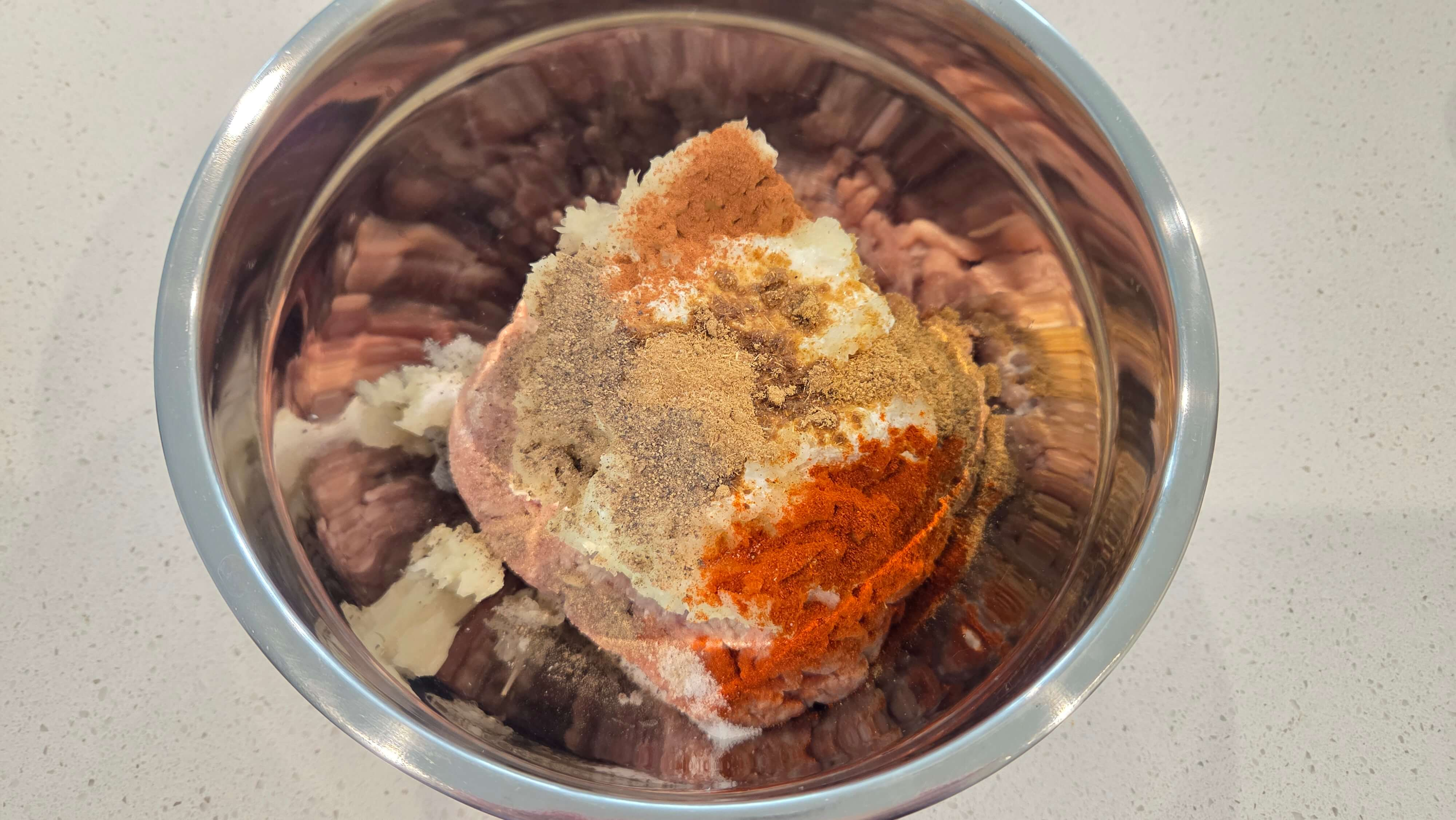 Combining and seasoning doner kebab meat