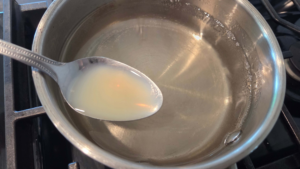 Adding lemon juice to the syrup for vegan basbousa