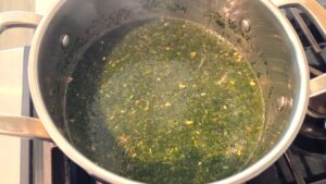 Finished Egyptian molokhia ready to serve after adding garlic and coriander