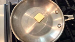 Melting butter for traditional molokhia tasha