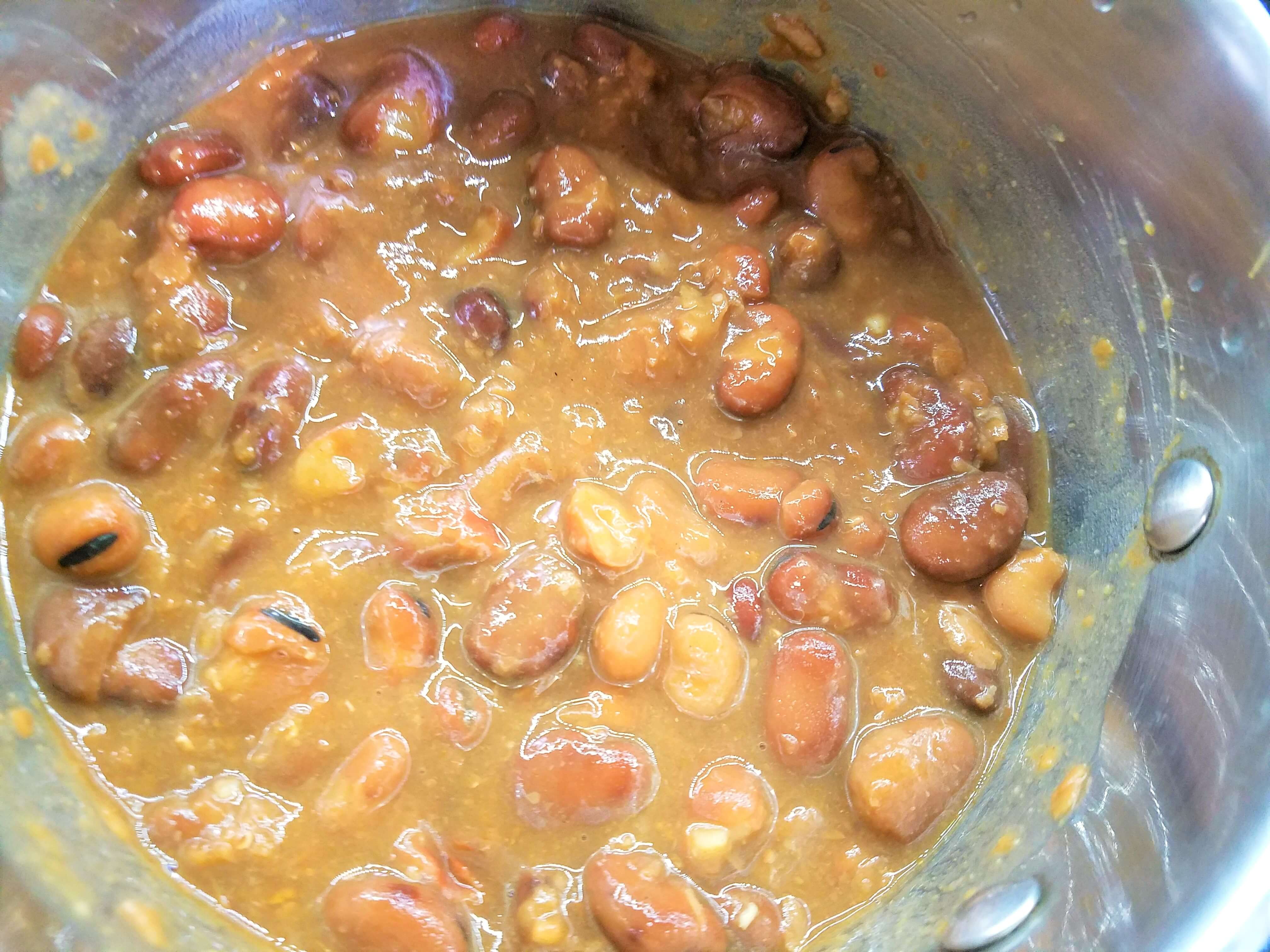 Simmering pot of fava beans.