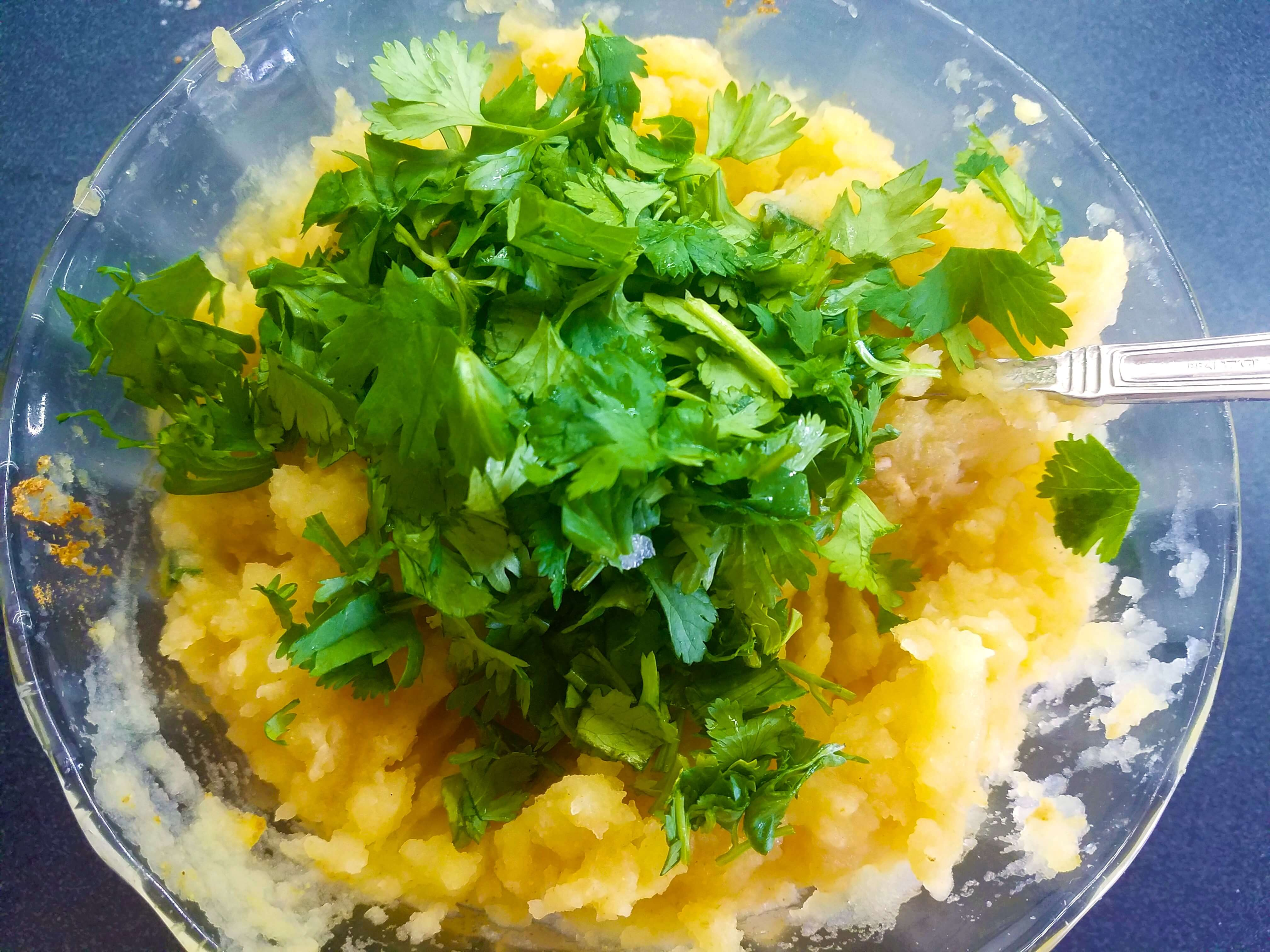 Lemon juice, cilantro, garlic, olive oil, and cumin added to mashed potatoes