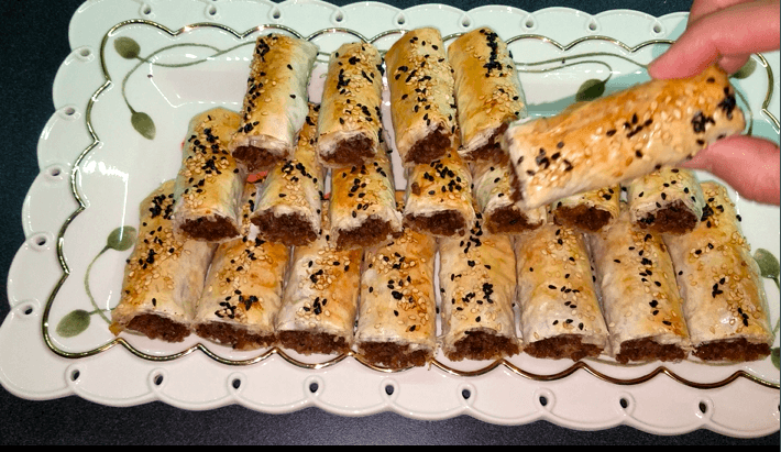 Golden crispy phyllo rolls filled with savory seasoned ground beef