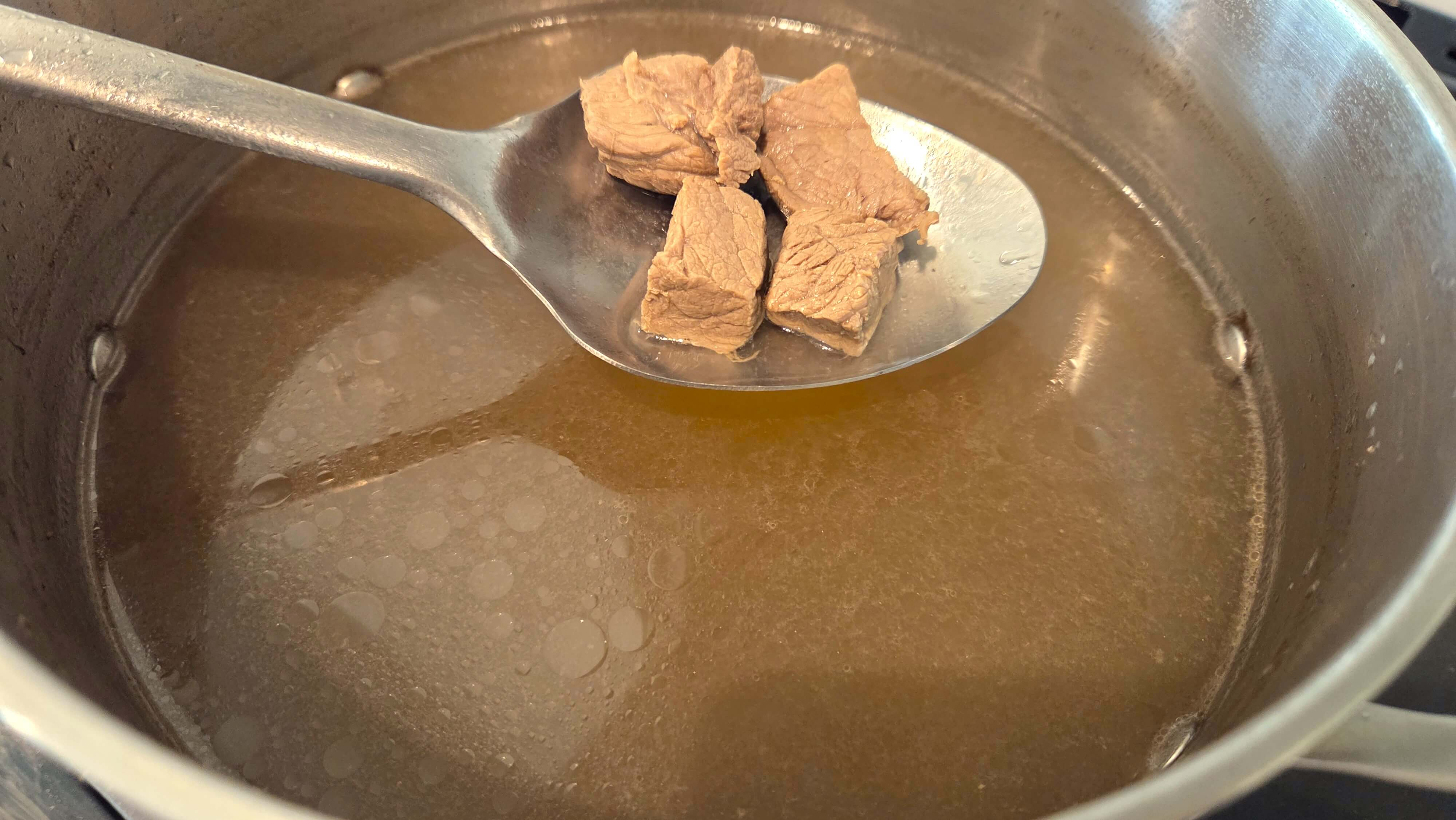 Tender beef simmering in a flavorful broth.