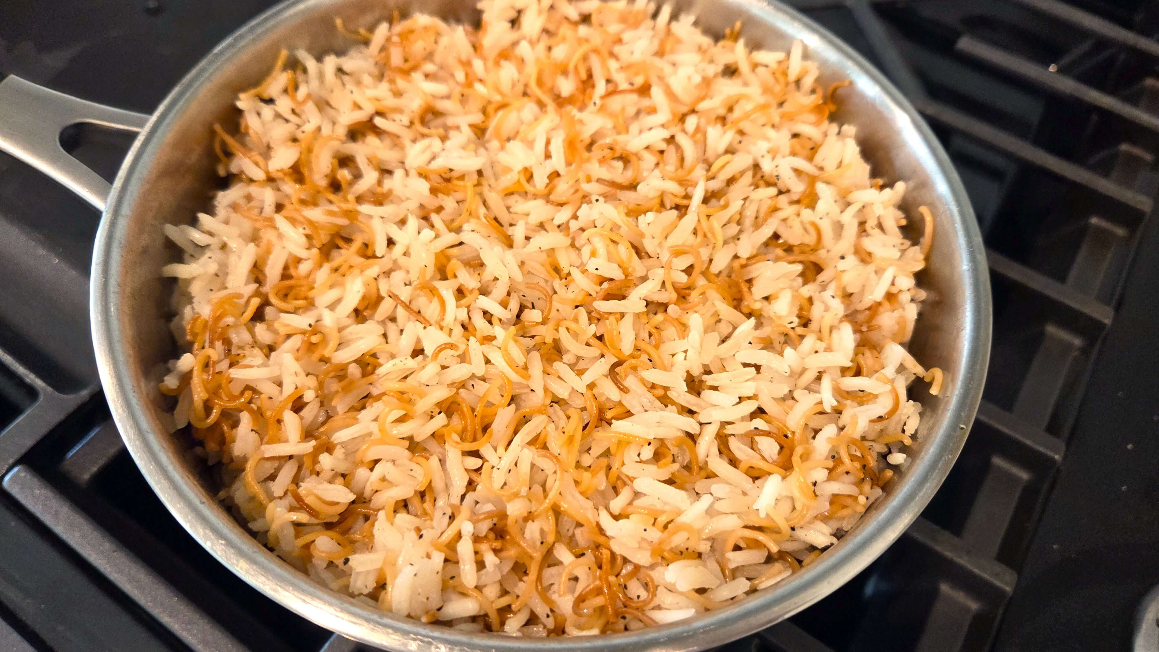 Fluffy Egyptian vermicelli rice prepared with beef broth and toasted vermicelli.