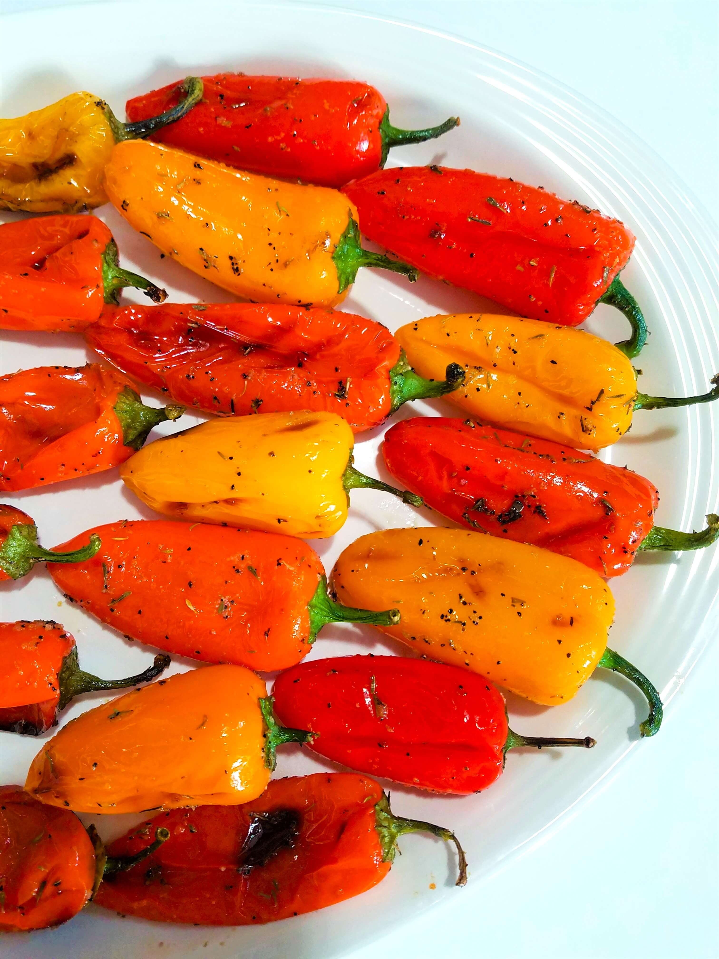 Grilled mini sweet peppers served as an easy vegetable side dish