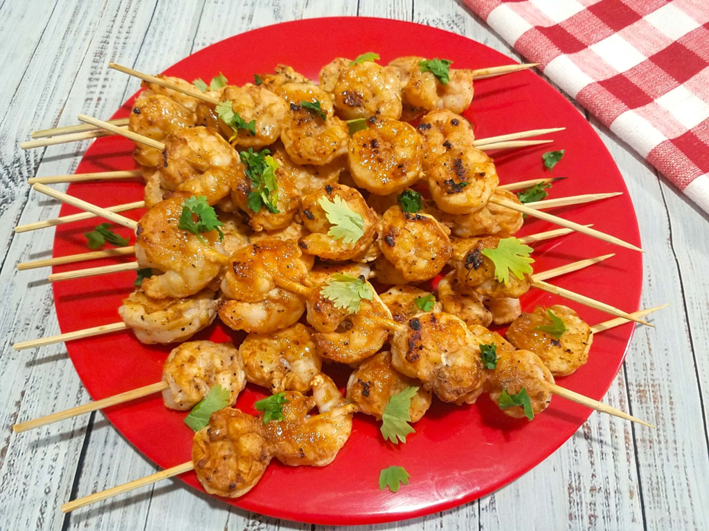 Juicy grilled shrimp kabobs served with lemon and fresh parsley.