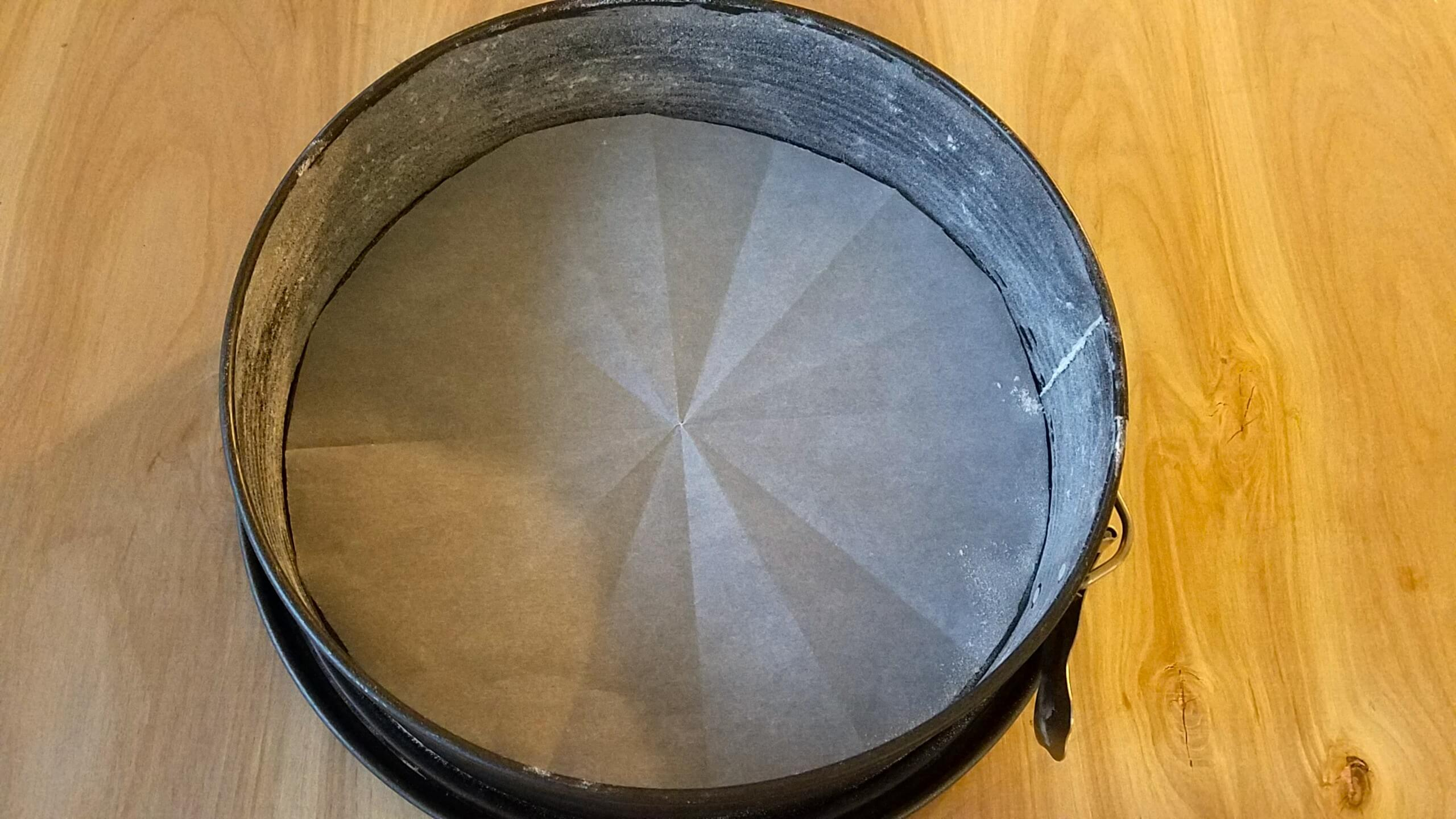 Greased and prepared 9-inch round cake pan.