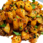 Batata Harra Lebanese spicy potatoes with crispy golden edges, garlic, cilantro, and lemon