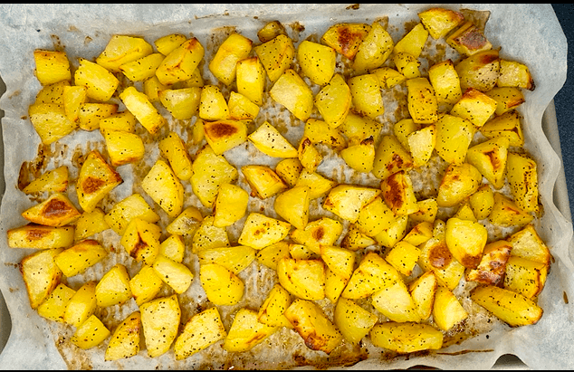 Yellow potato cubes roasted until golden and crispy around the edges